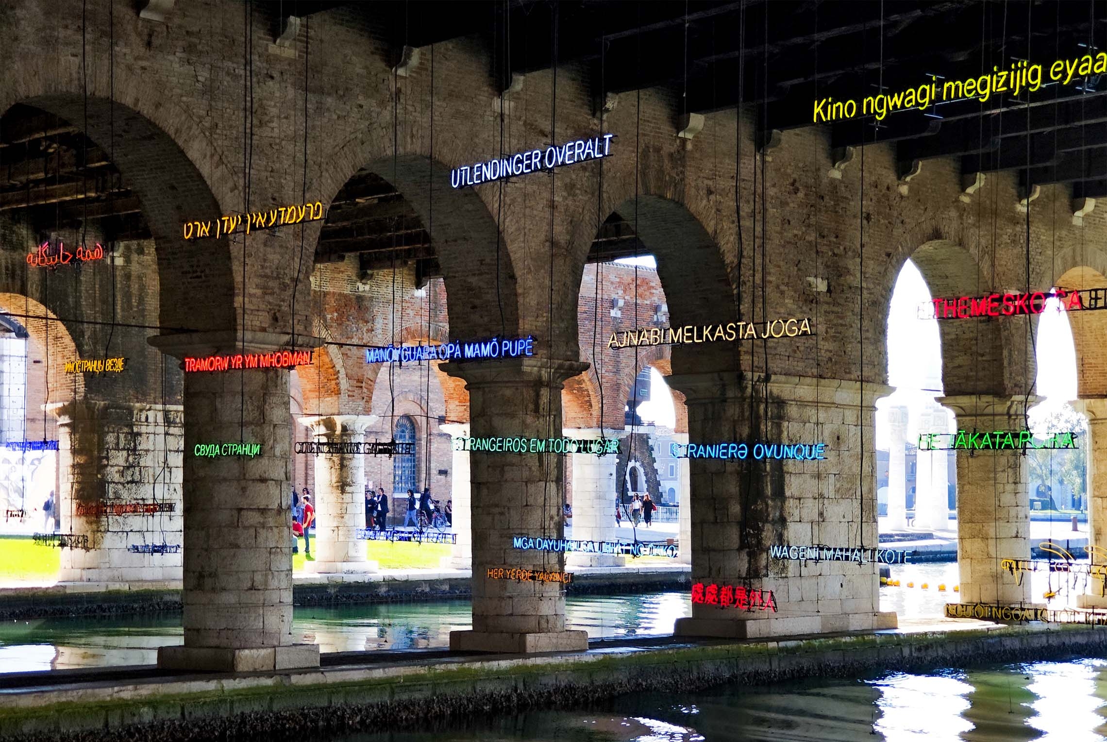 Work by the Claire Fontaine collective. Neon sculptures in various colors displaying the phrase