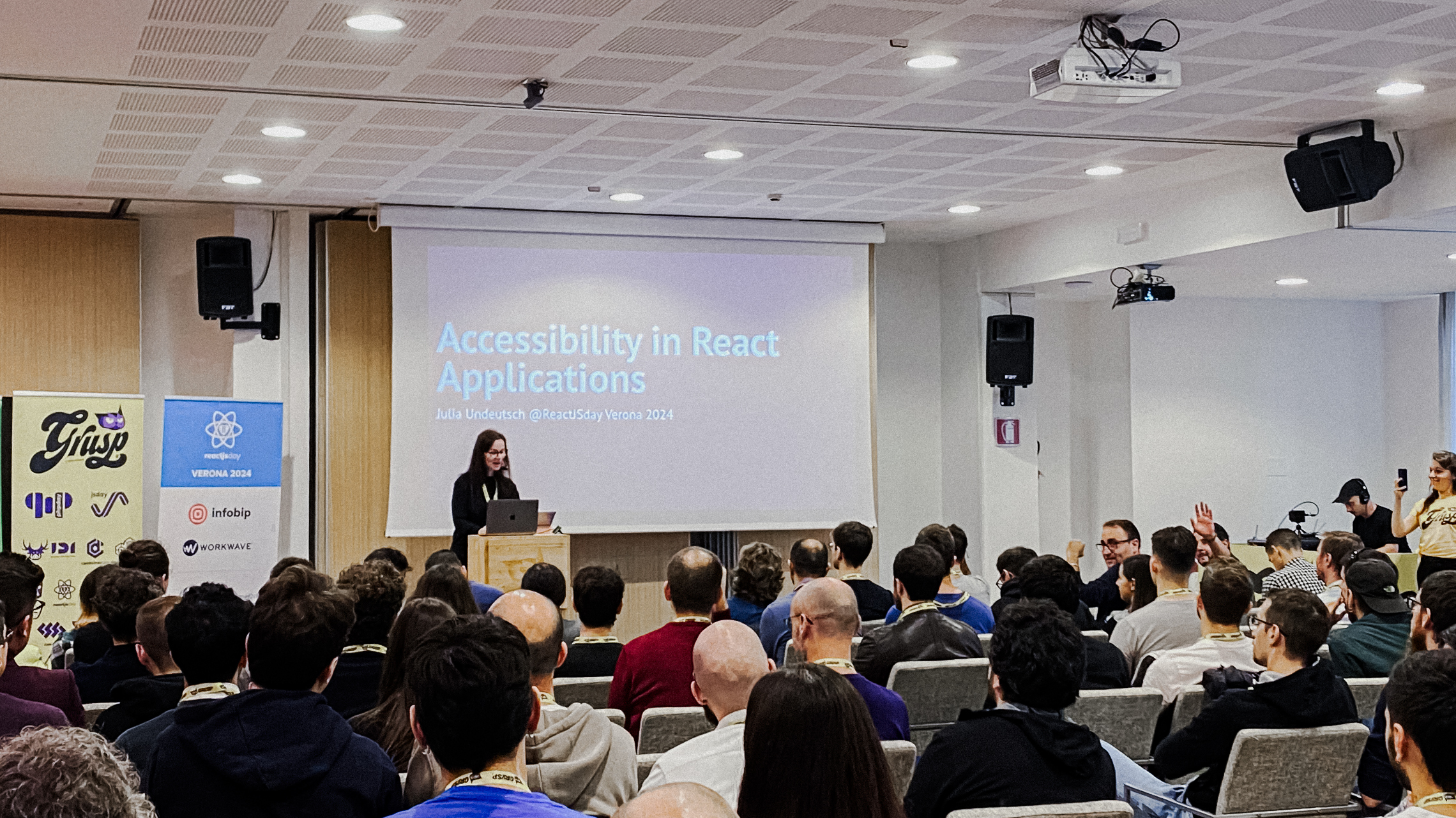 People attending the conference Accessibility in React applications People attending the conference Accessibility in React applications